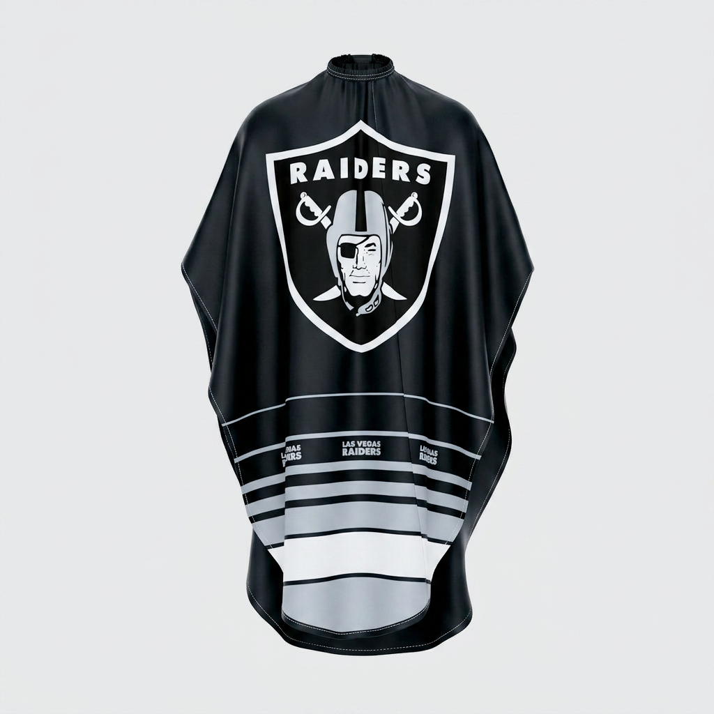 Black poncho with Oakland Raiders logo on a light gray background