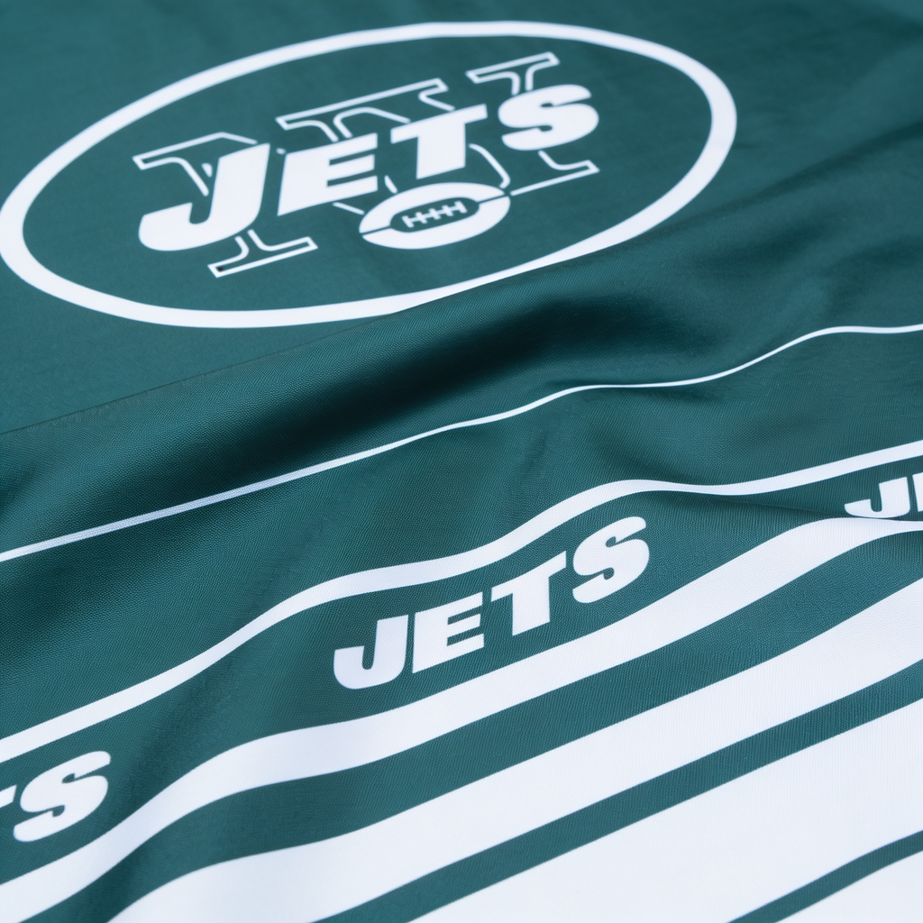 Green fabric with 'JETS' logo and text