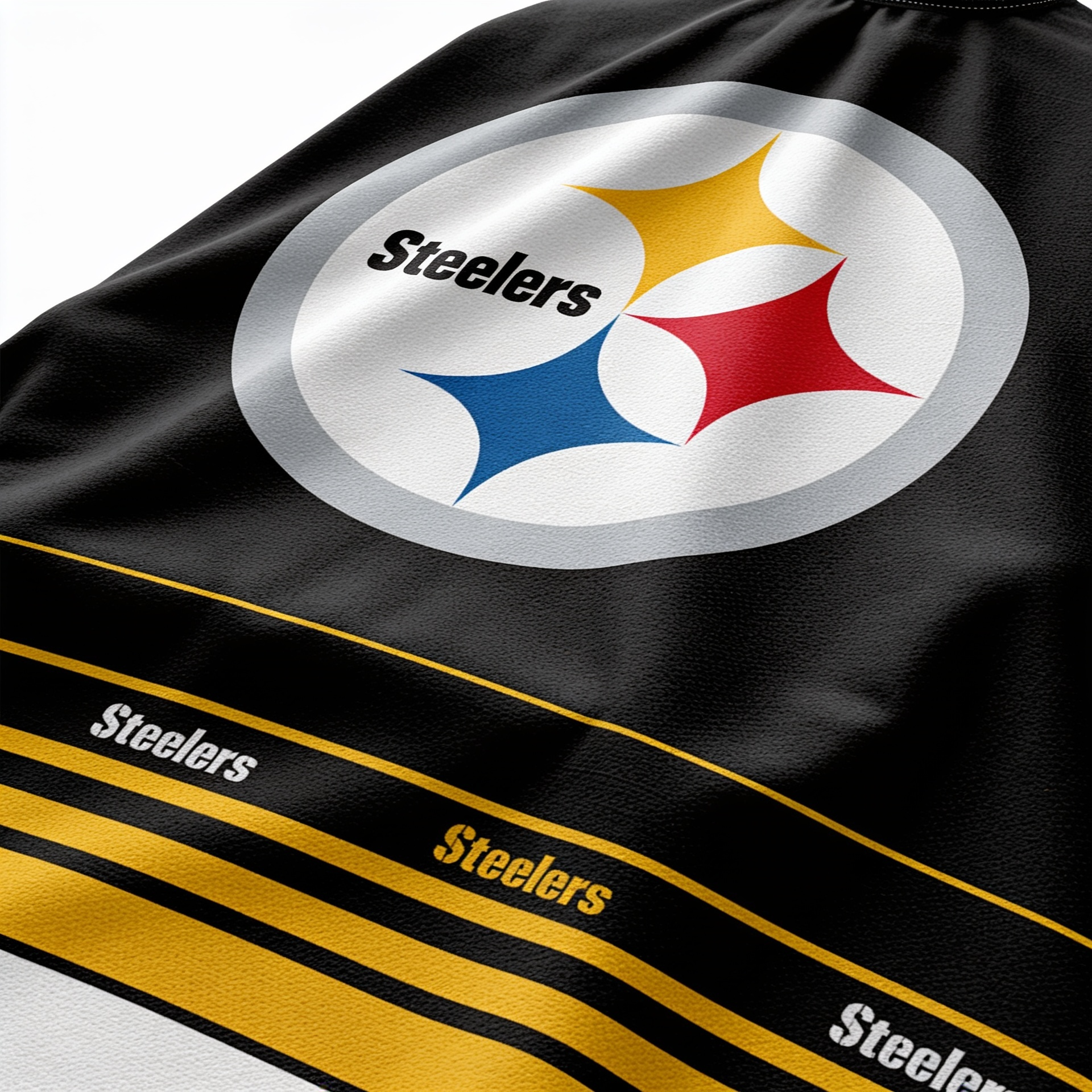Close-up of a black barber cape with Steelers logo and text